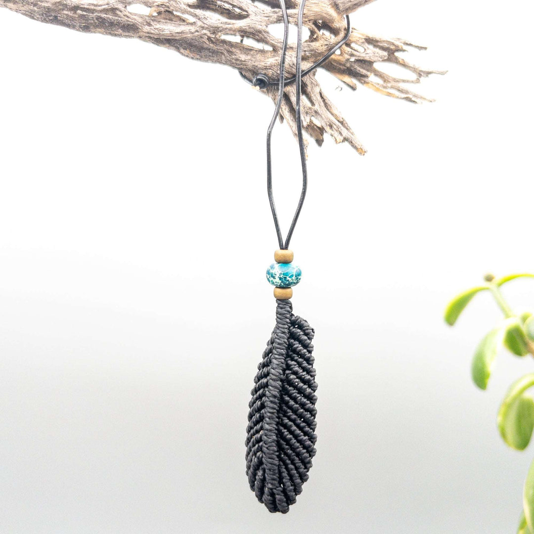 small black macrame feather diffuser with lava bead