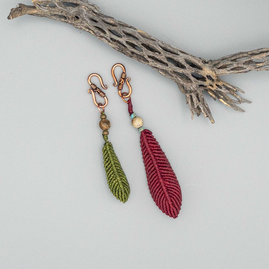 comparison of large and small macrame feather diffuser charms on copper clip