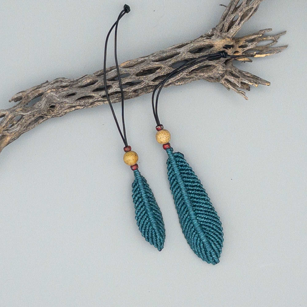 small and large macrame feathers for size comparison