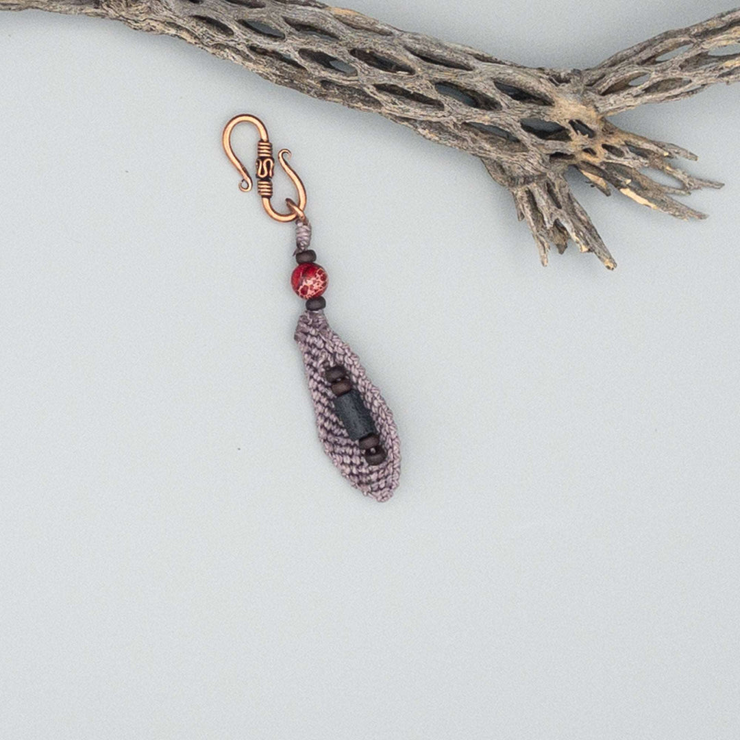 back of small lavender macrame feather diffuser clip