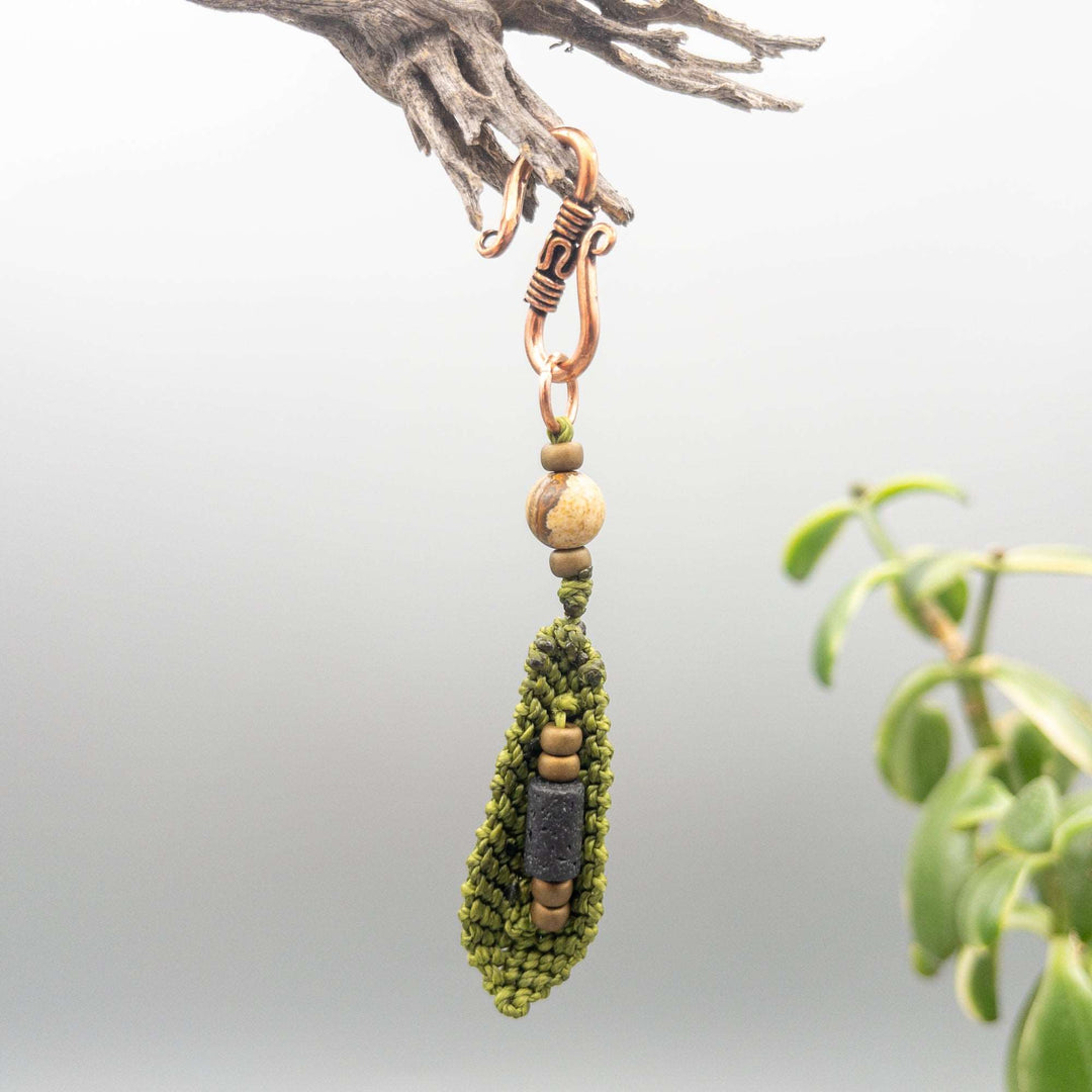 back of olive macrame feather diffuser clip showing lava bead