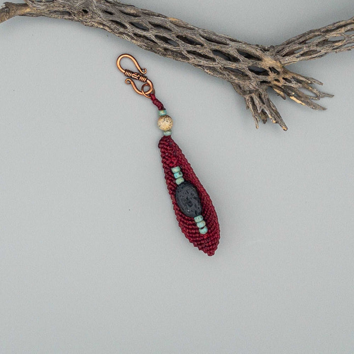 Macrame Feather Diffuser Clip backside of red feather