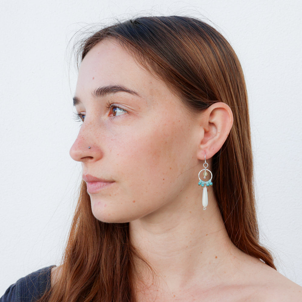 handmade macrame sterling silver dangle earrings with mother of pearl and yellow opal