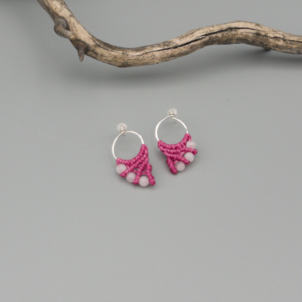 pink macrame and moonstone earrings sterling silver on a gray background