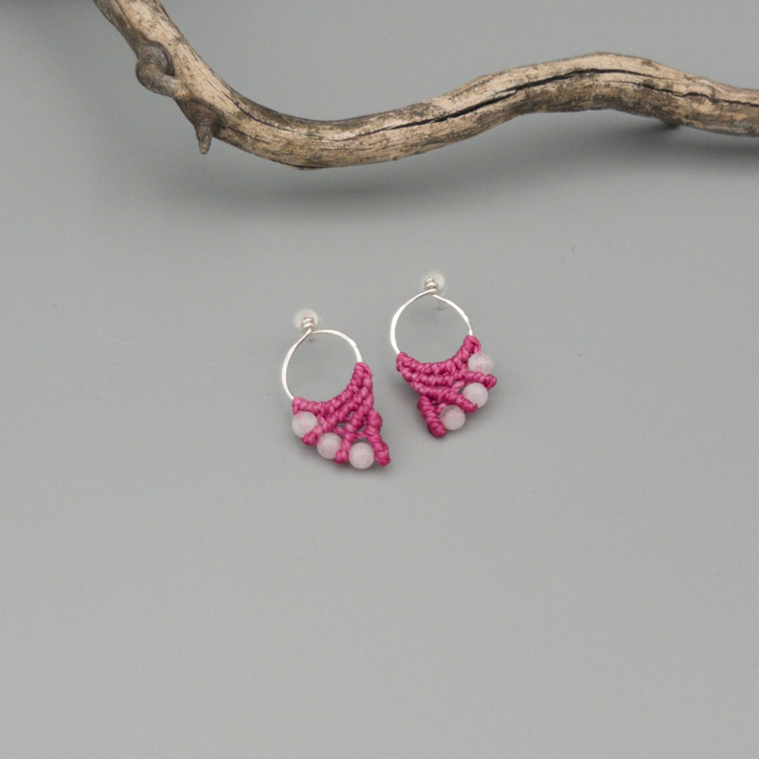 pink macrame and moonstone earrings sterling silver on a gray background
