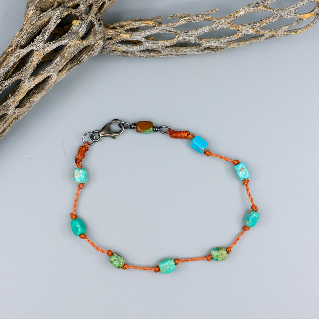 Handmade urquoise bracelet on hand knotted terracotta cord with sterling silver clasp. 