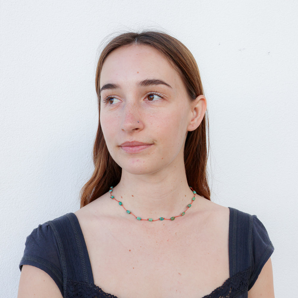 hand knotted turquoise nekclace on a terracotta cord