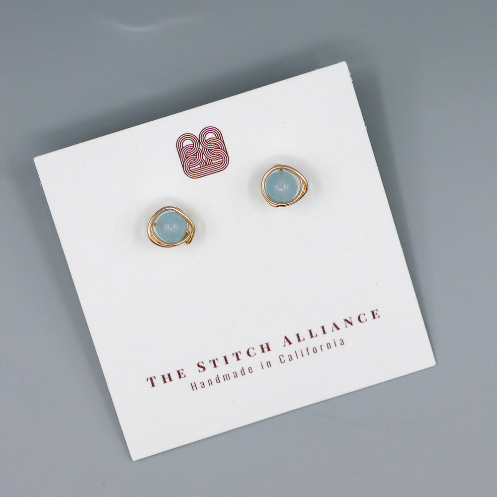 gold fill aqauamarine stud earrings handmade earrings on a white card