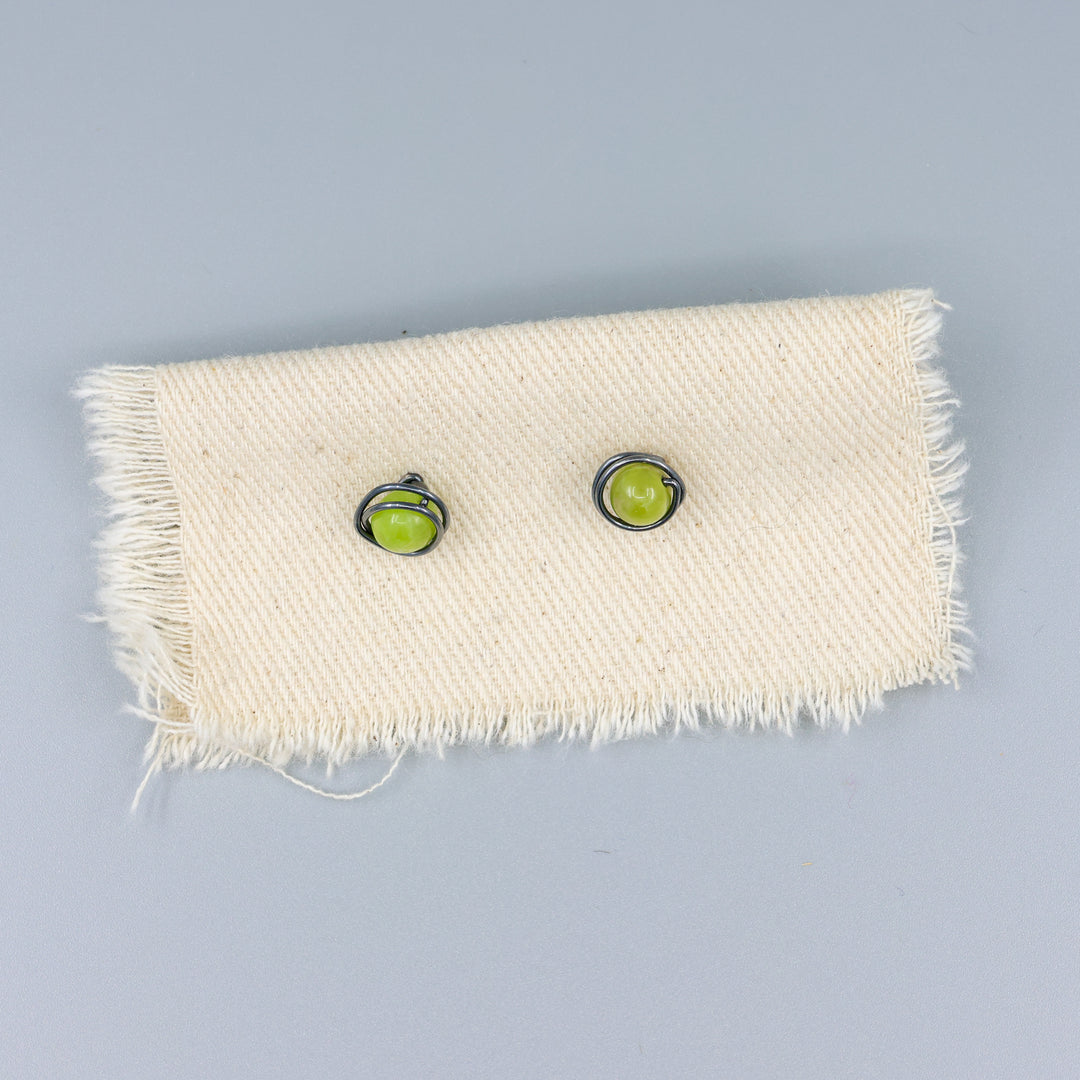peridot stud earrings wire wrapped oxidized sterling silver