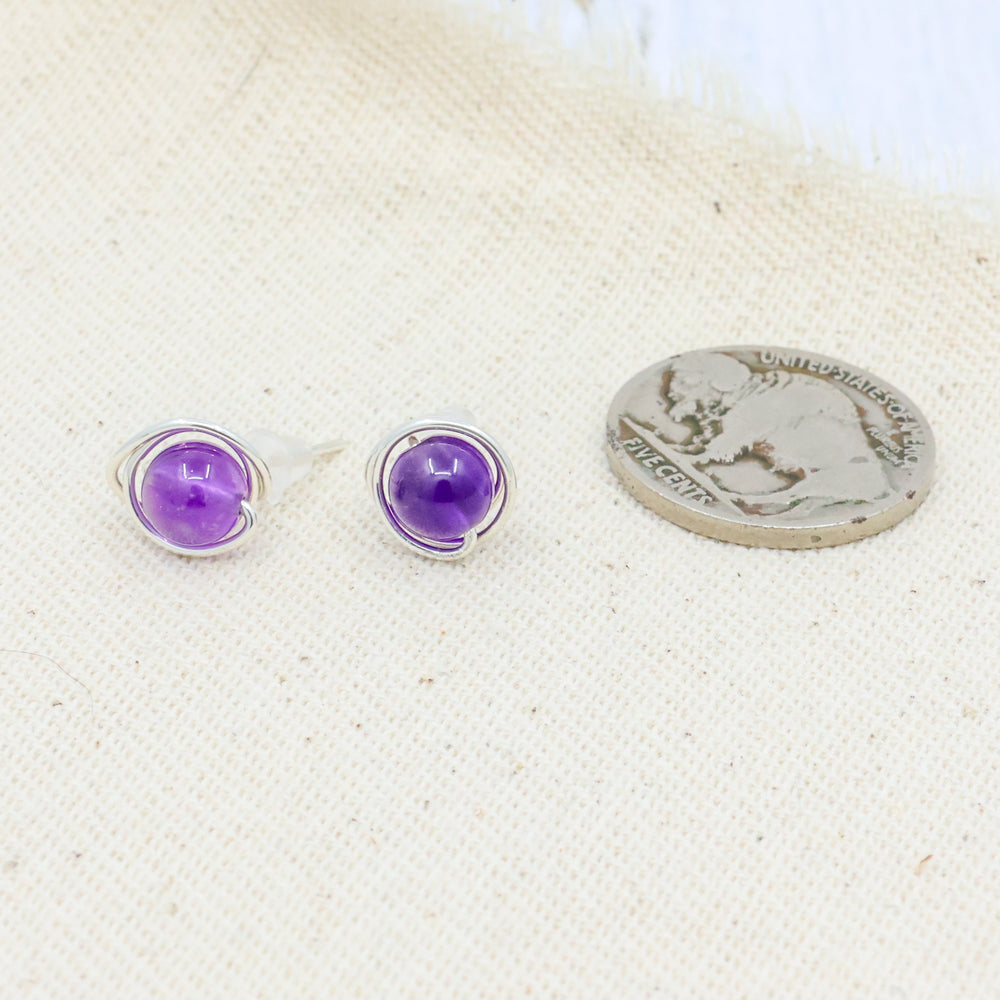 handmade sterling silver amethyst stud earrings with coin for size comparison