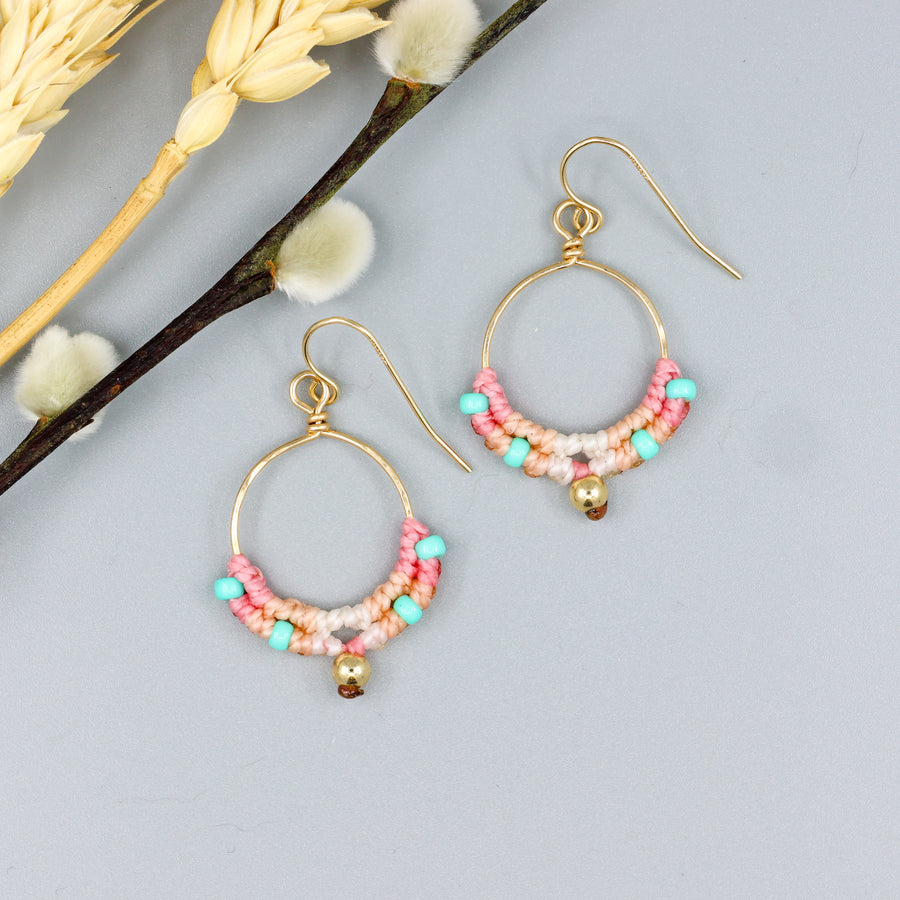 handmade round gold hoops with macrame deatils in coastal sunset colors