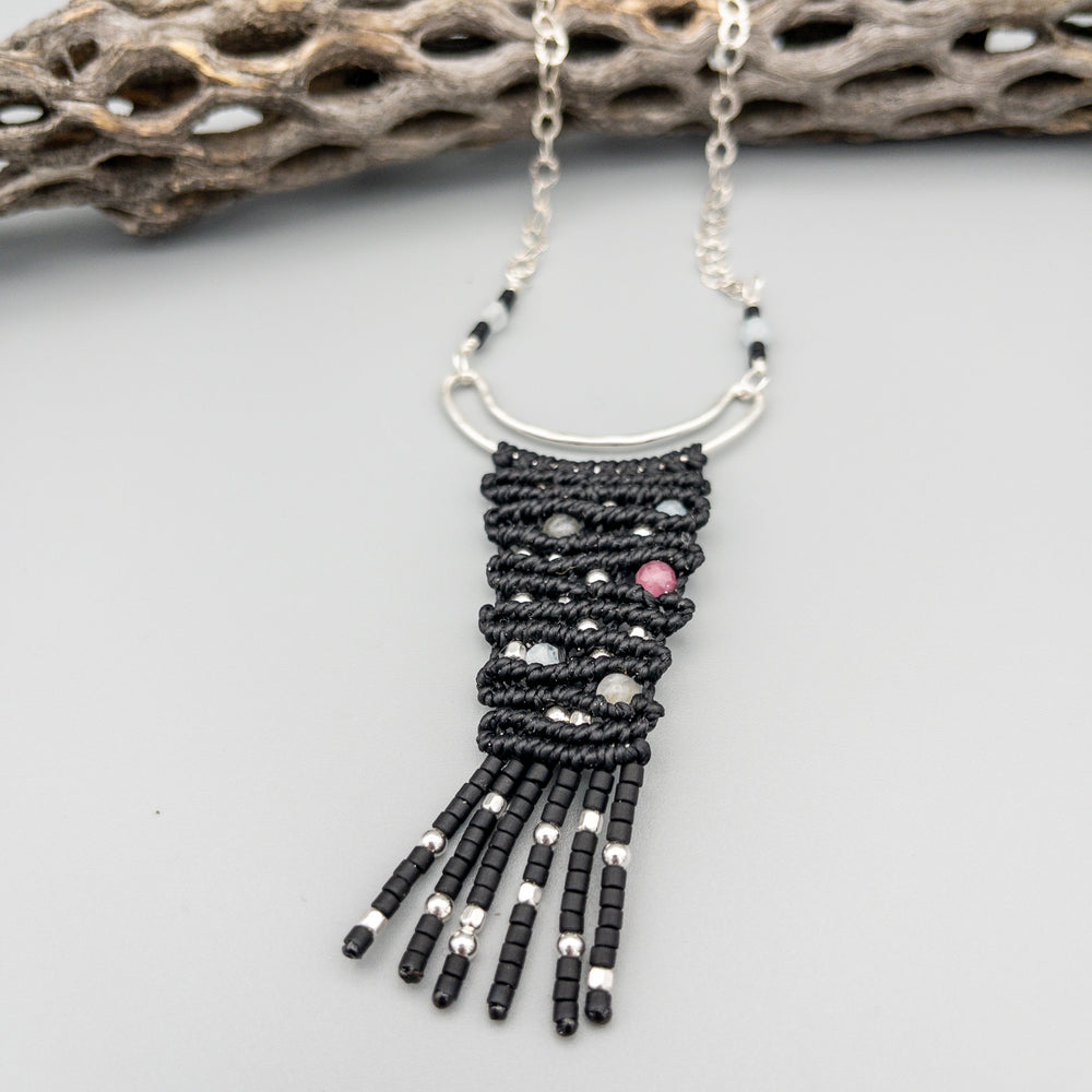 detail of Night sky handwoven macrame necklace with sterling silver, pink tourmaline, aquamarine, and labradorite