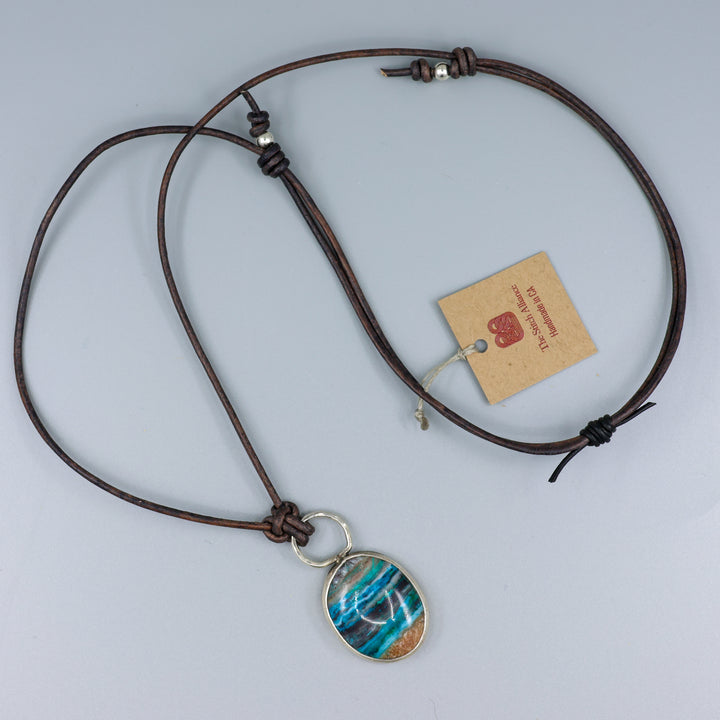 full view handmade ocean jasper and sterling silver necklace on a leather cord