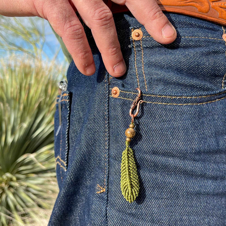 macrame feather charm on copper clip with lava bead diffuser in olive green