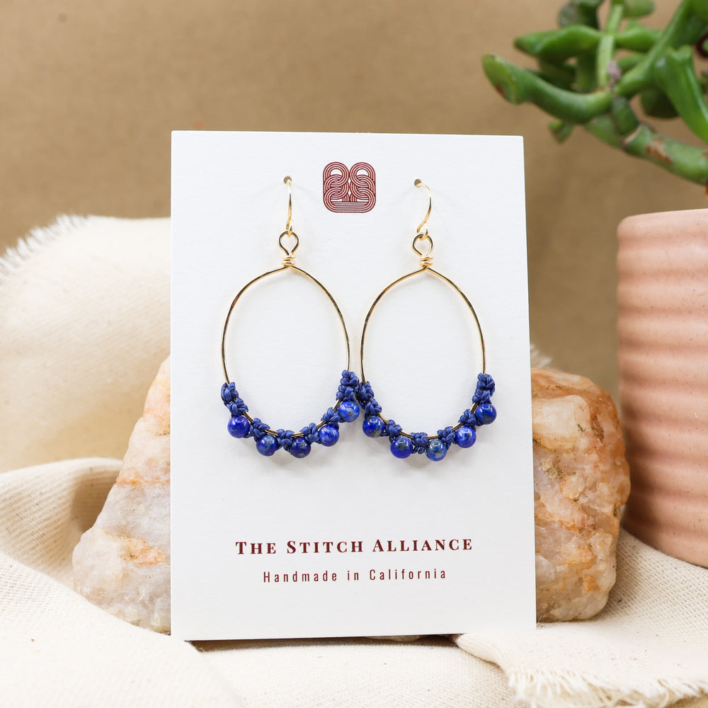 Lapis lazuli oval hoop earrings 14k gold filled on white card