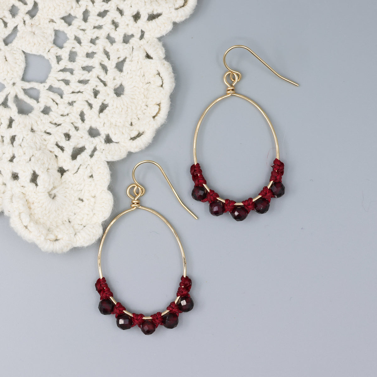 handmade gold macrame hoop earrings with garnet beads