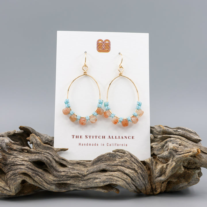 handmade sunstone and gold fill macrame earrings on a white card