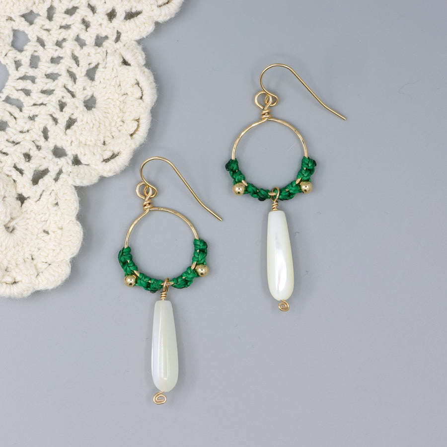 handmade gold hoops with mother of pearl beads and green macrame