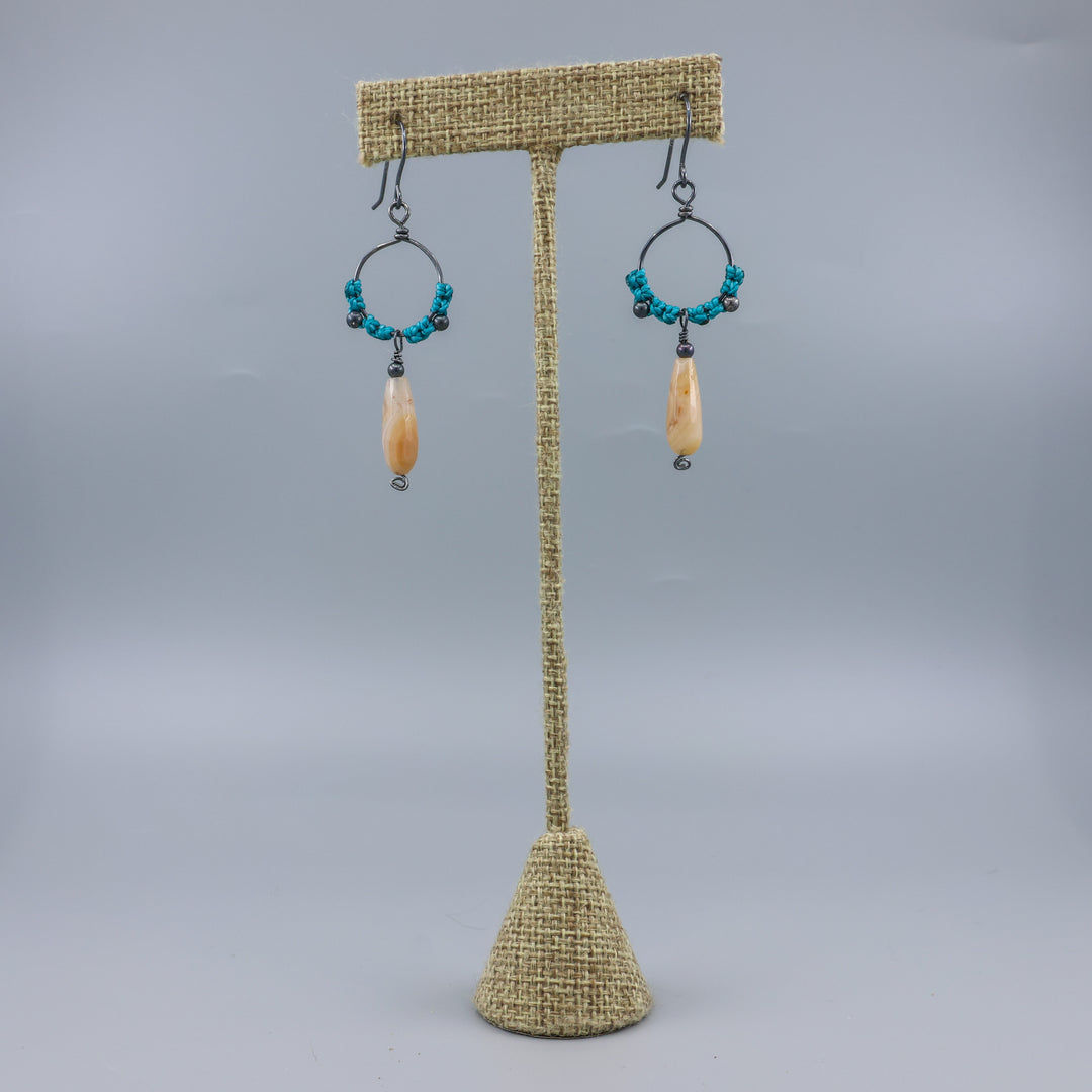 handmade macrame hoop earrings in oxidized sterling silver with botswana agate beads on a linen hanger