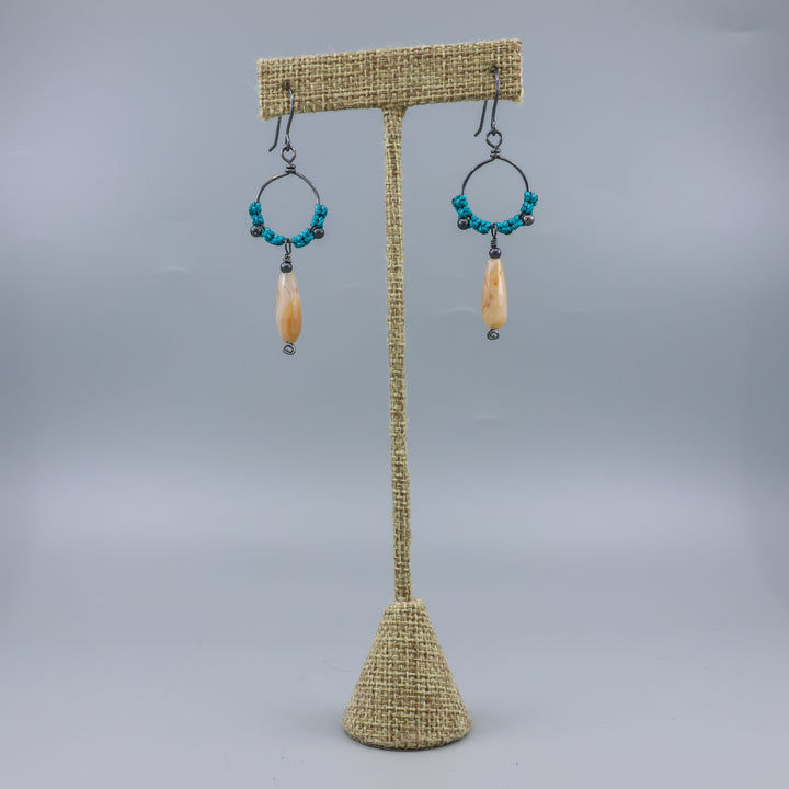 handmade macrame hoop earrings in oxidized sterling silver with botswana agate beads on a linen hanger