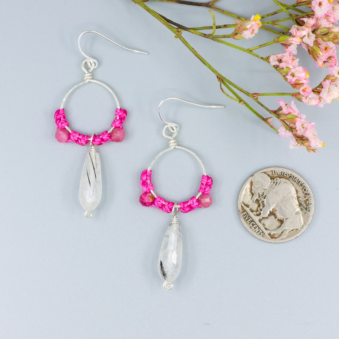 handmade sterling silver hoop earrings with tourmalated quartz and pink tourmaline beads with a nickel for size comparison