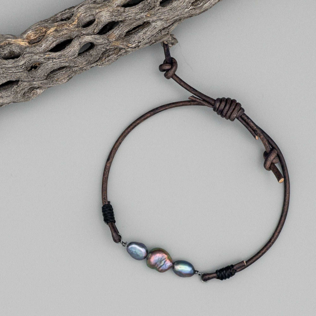 dark gray freshwater pearl, leather, and sterling silver bracelet