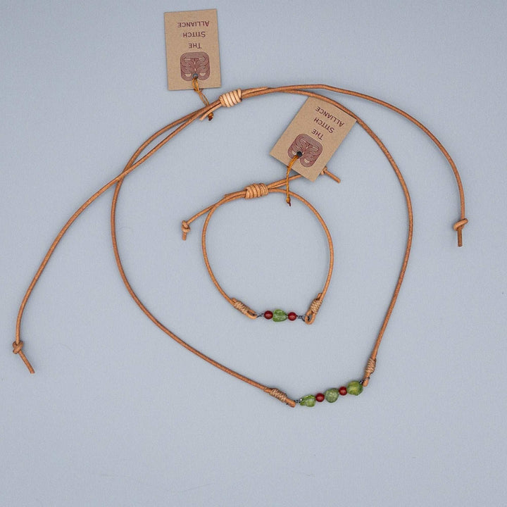 peridot and carnelian bracelet on a natural leather cord shown with the matching necklace