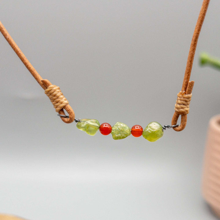 Peridot and carnelian necklace on oxidized sterling silver and natural leather