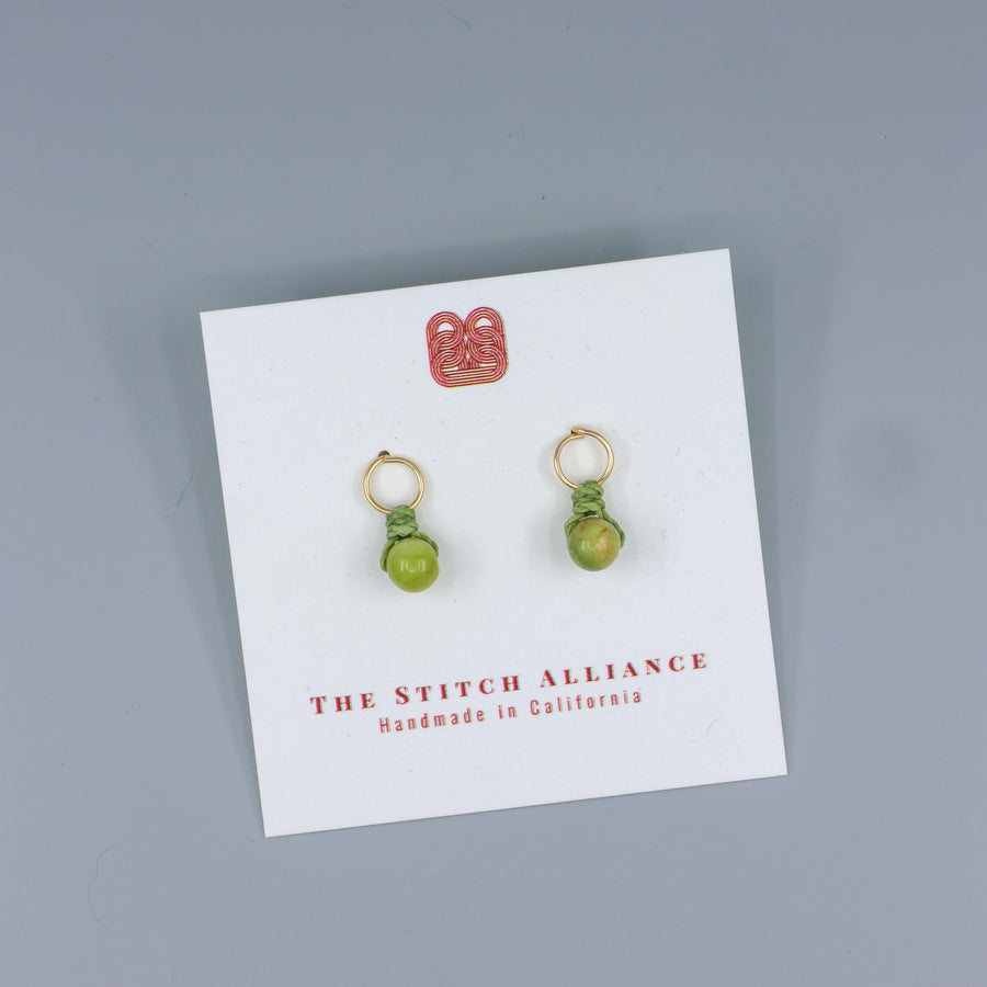 peridot mini dangle earring gold fill handmade on a white card