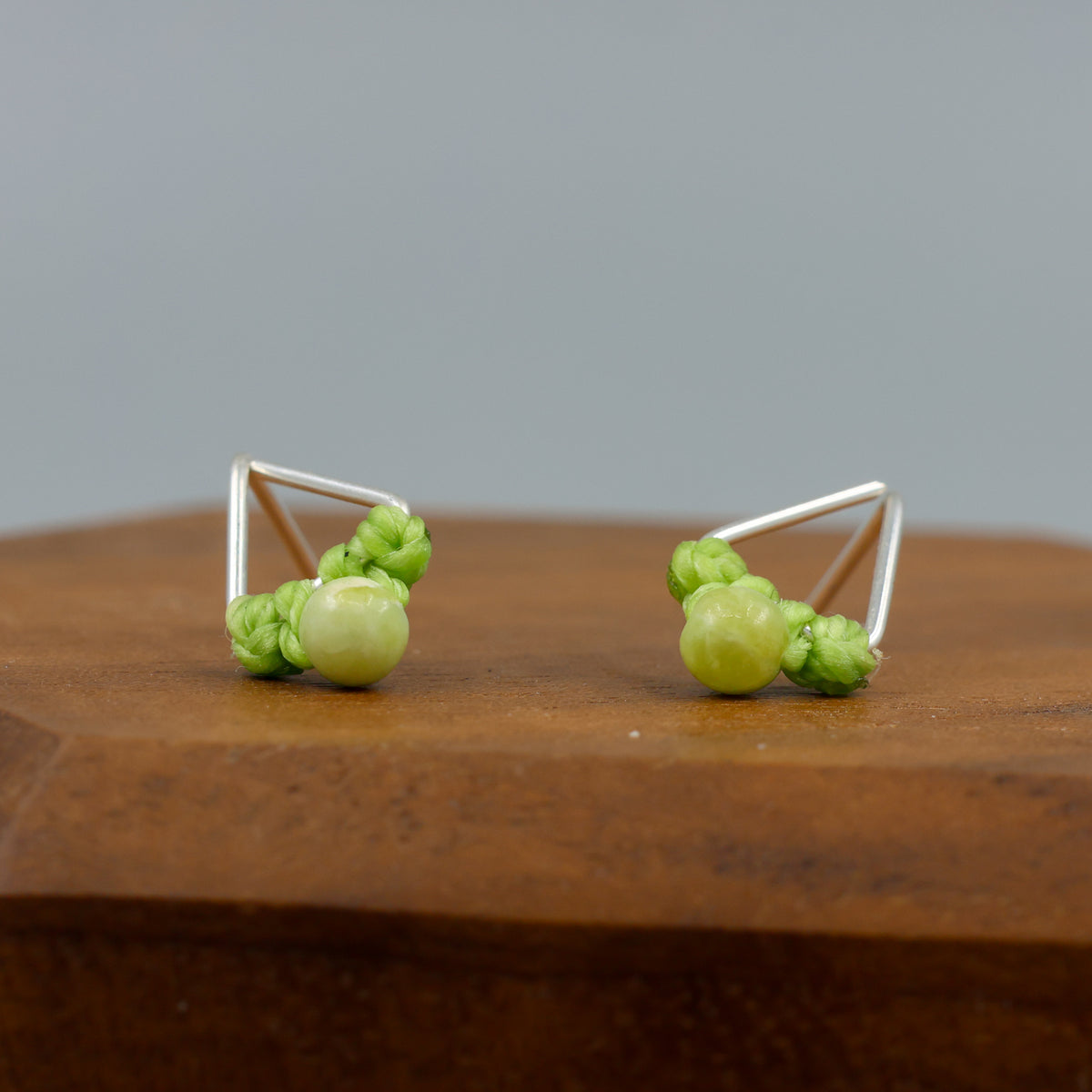 peridot stud earrings sterling silver triangle