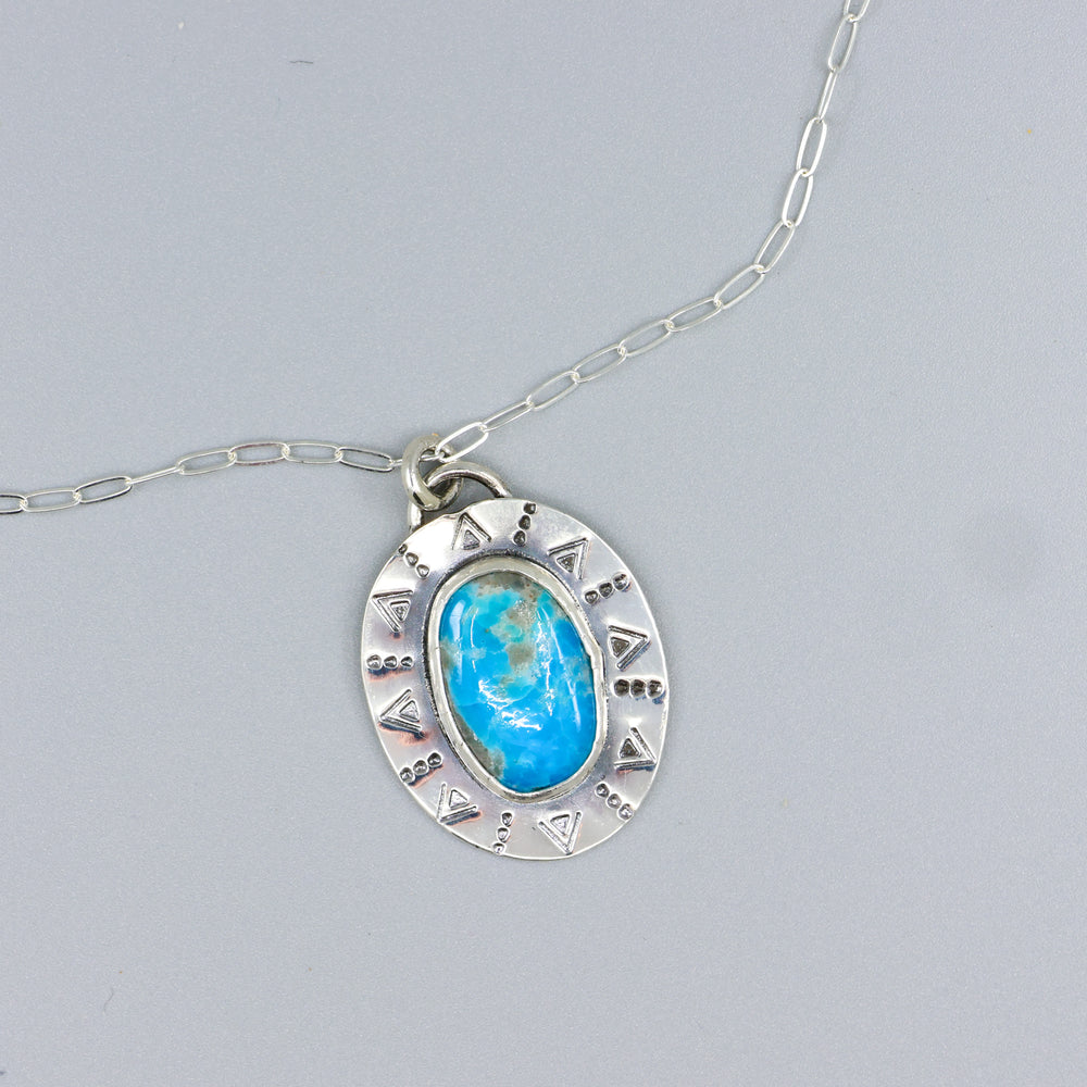 Persian turquoise one of a kind aterling silver pendant on a silver chain