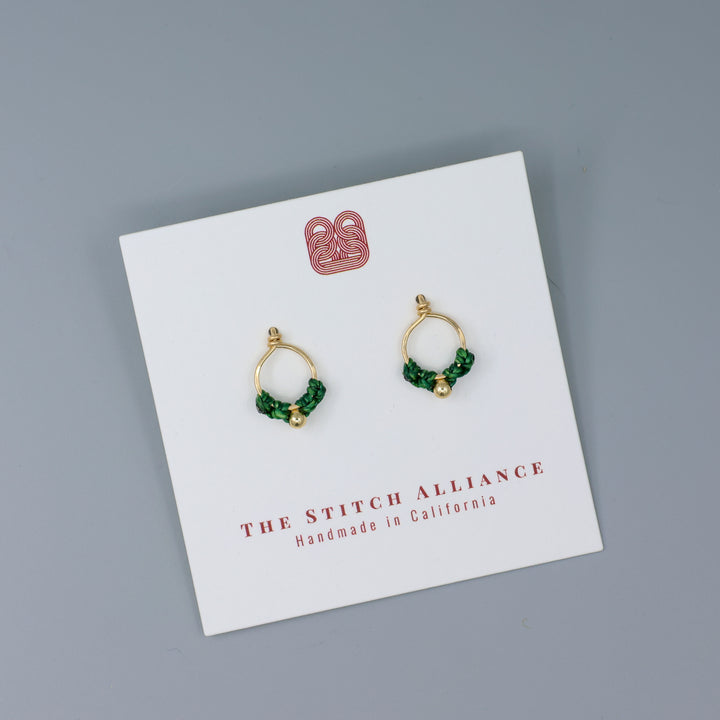 handmade gold filled minialist macrame earrings green on a white card