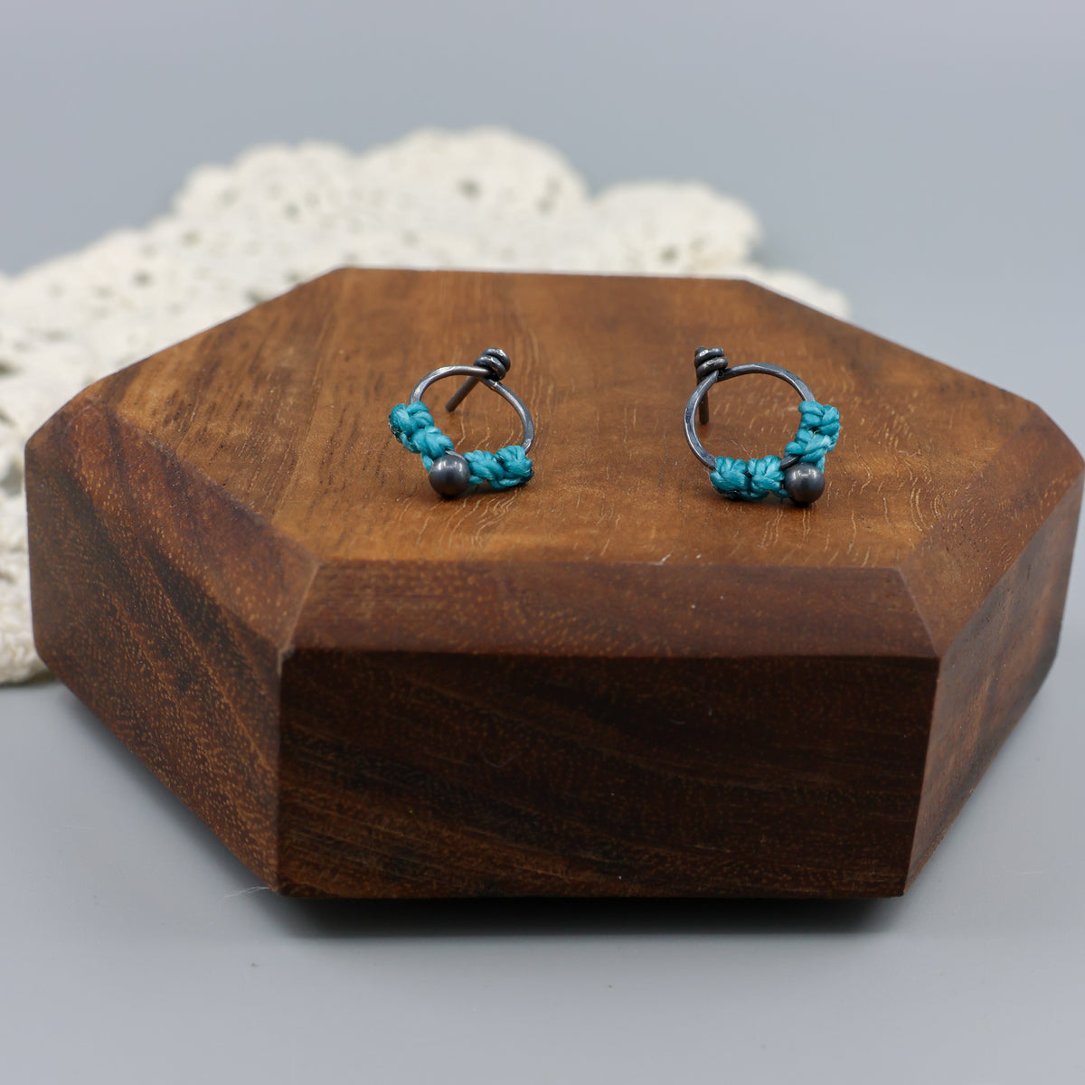 small, oxidized sterling silver macrame stud earrings in turquoise