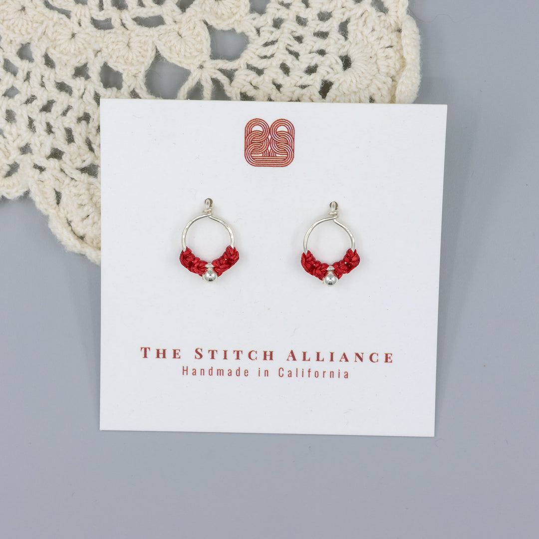 handmade sterling silver red macrame earrings on a white display card