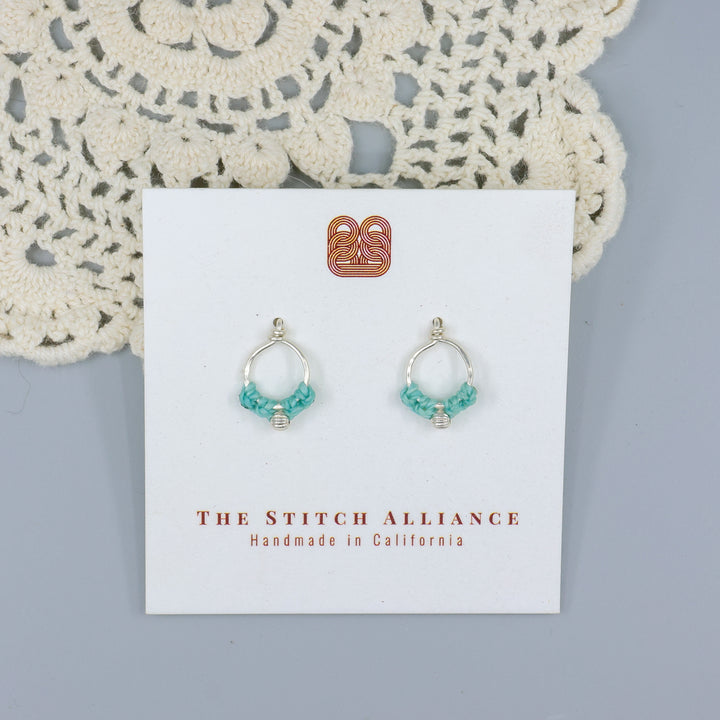 handmade sterling silver macrame earrings aqua blue on a white card