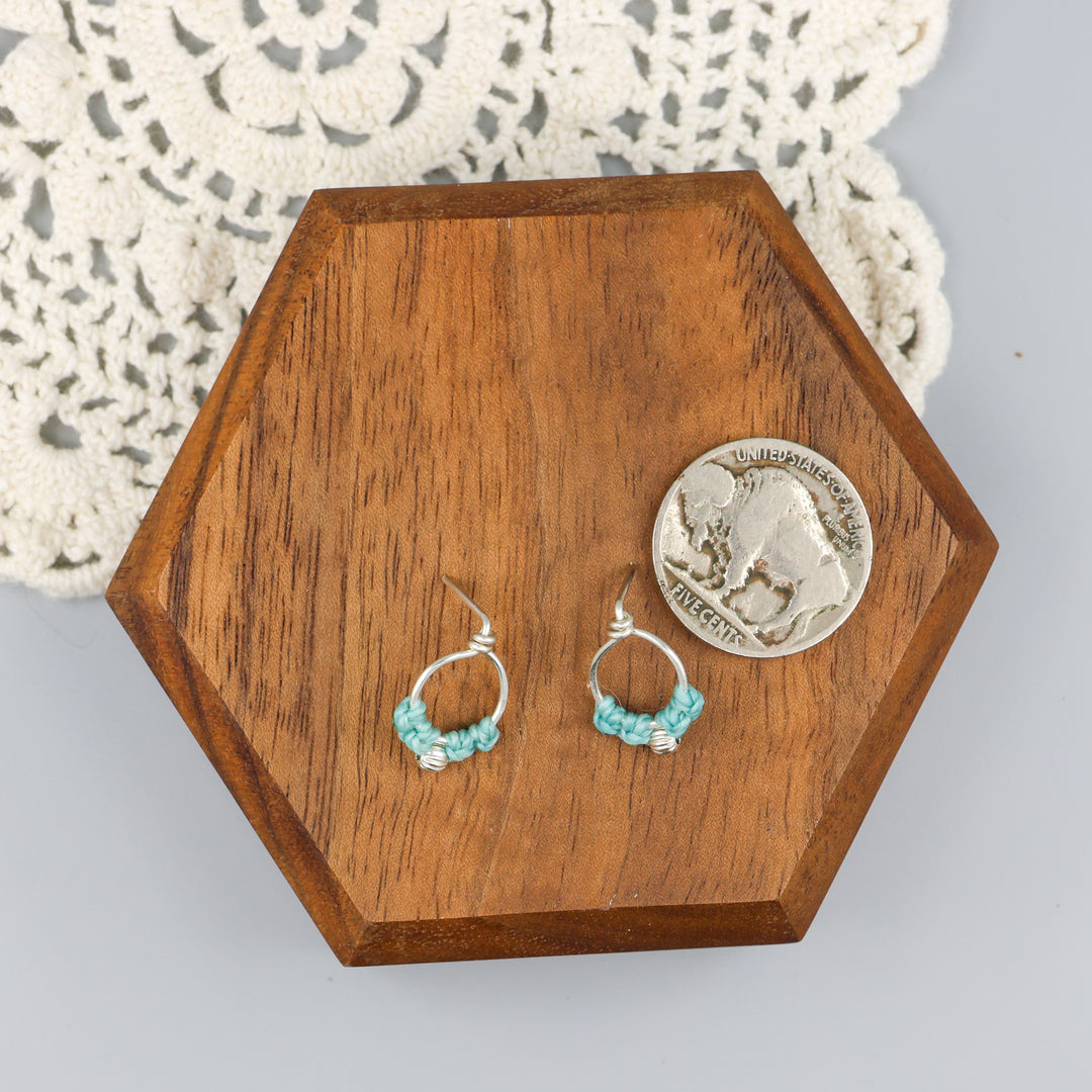 sterling silver macrame earrings aqua blue with a coin for size comparison