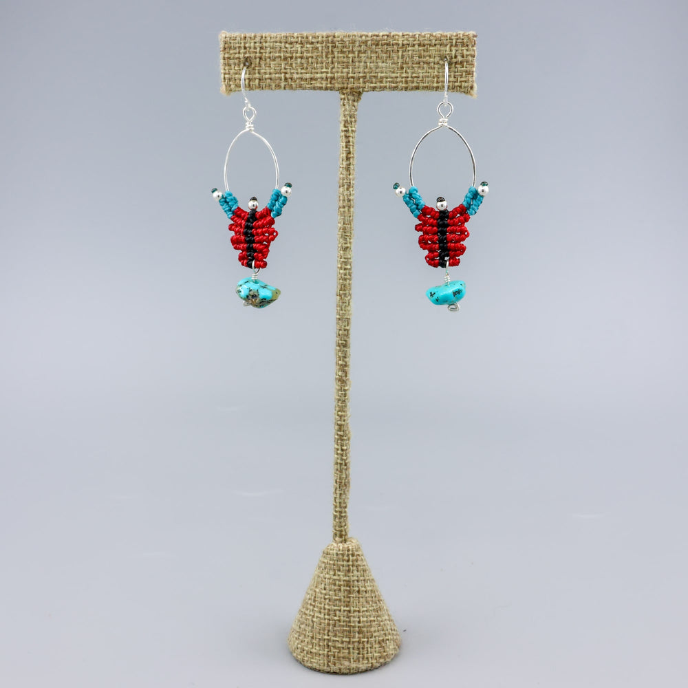 red, black, turquoise sterling silver macrame earrings with turquoise bead on a linen hanger