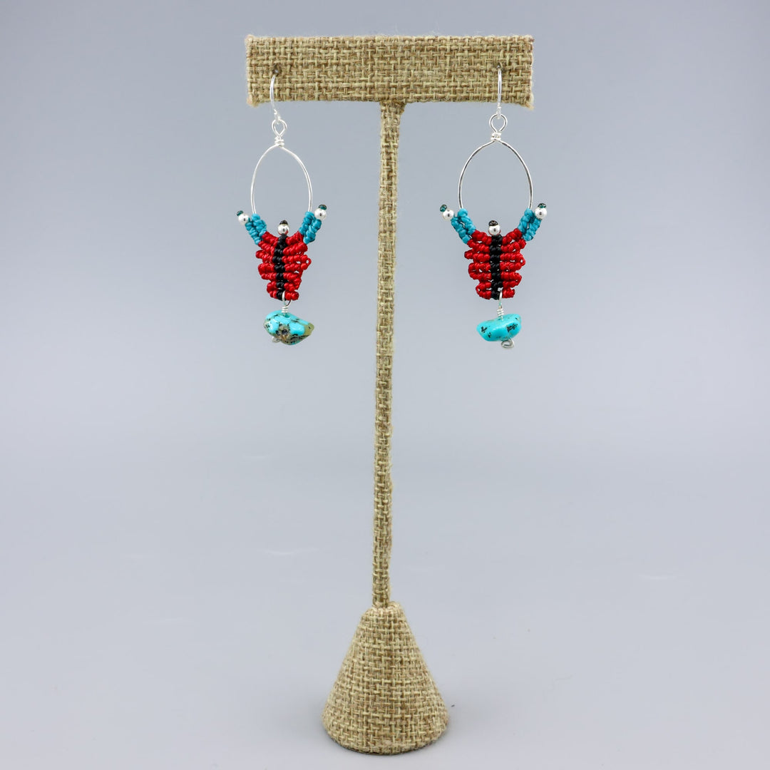 red, black, turquoise sterling silver macrame earrings with turquoise bead on a linen hanger