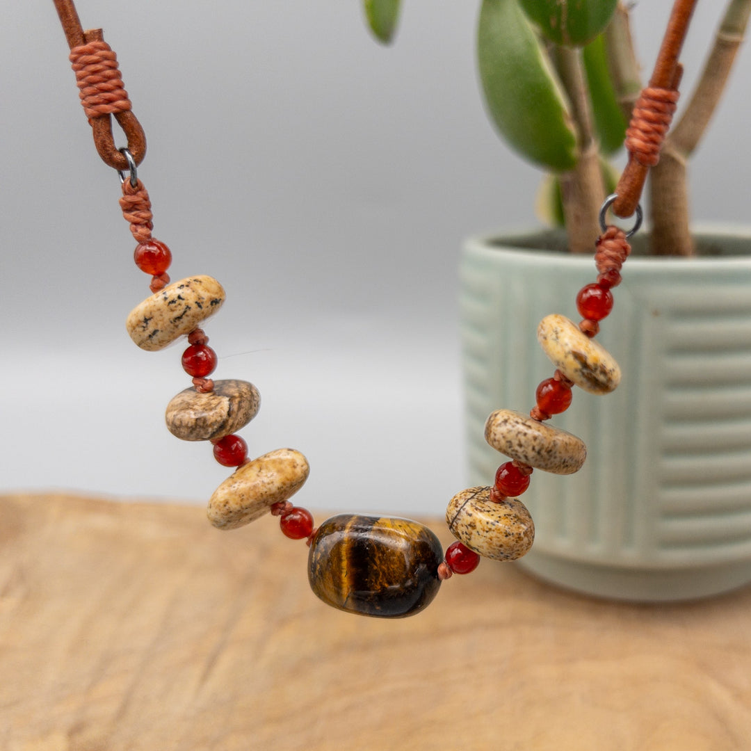Tigers eye, picture jasper, and carnelian hand-knotted beaded necklace detail view
