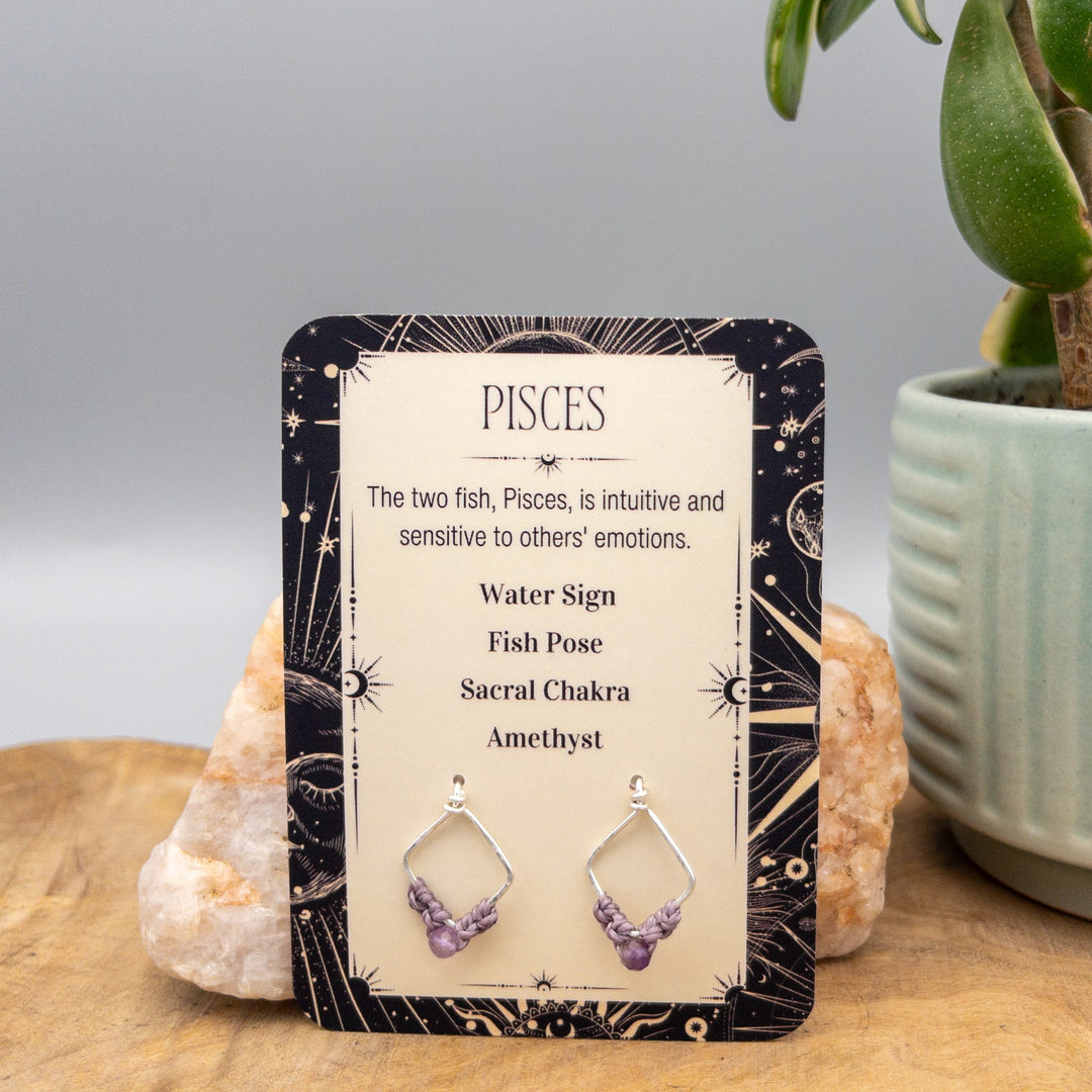 Pisces amethyst earrings in sterling silver on a gift card