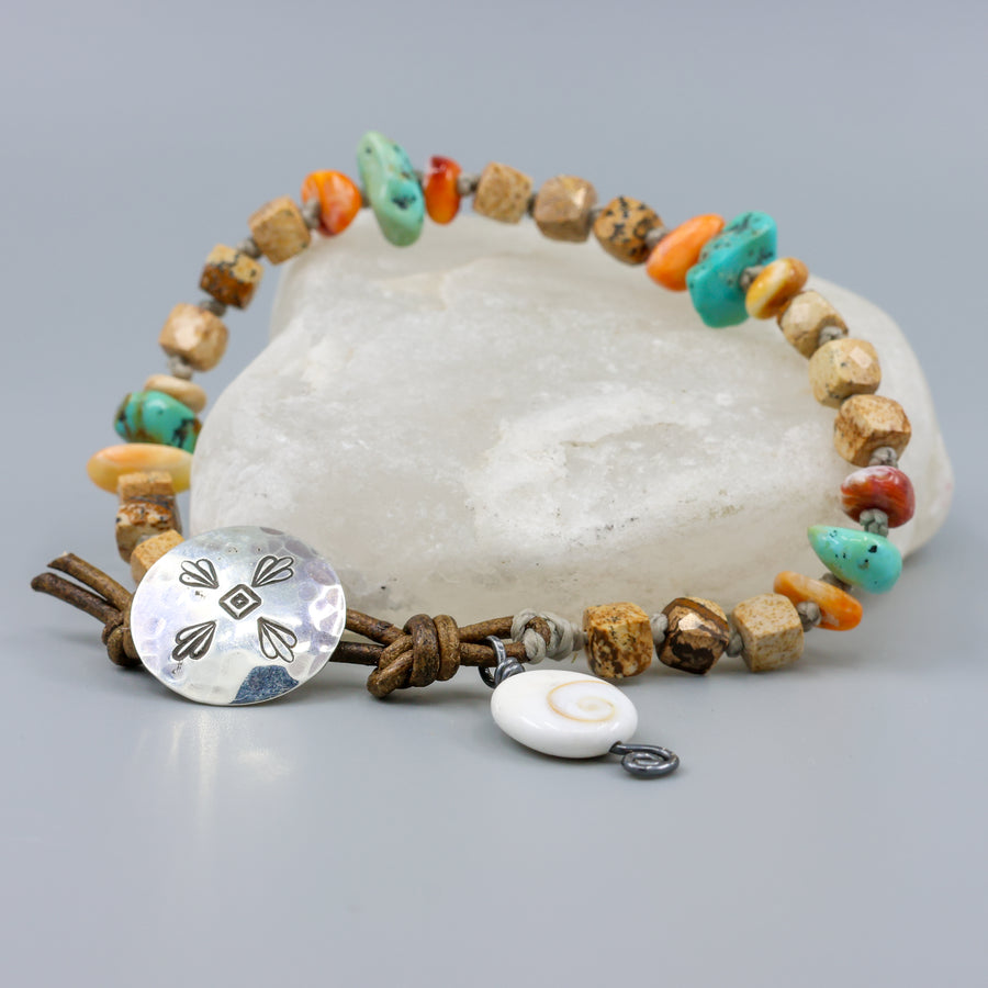 Picture Jasper, Turquoise, and Spiny Oyster handmade bracelet with leather and sterling silver button closure on crystal rock