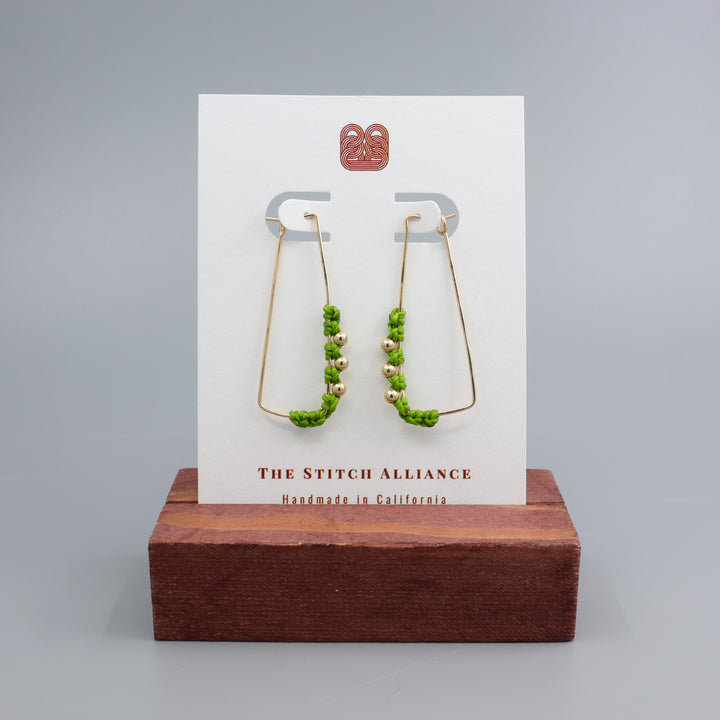 handmade macrame gold filled hoop earrings with green macrame and gold beads