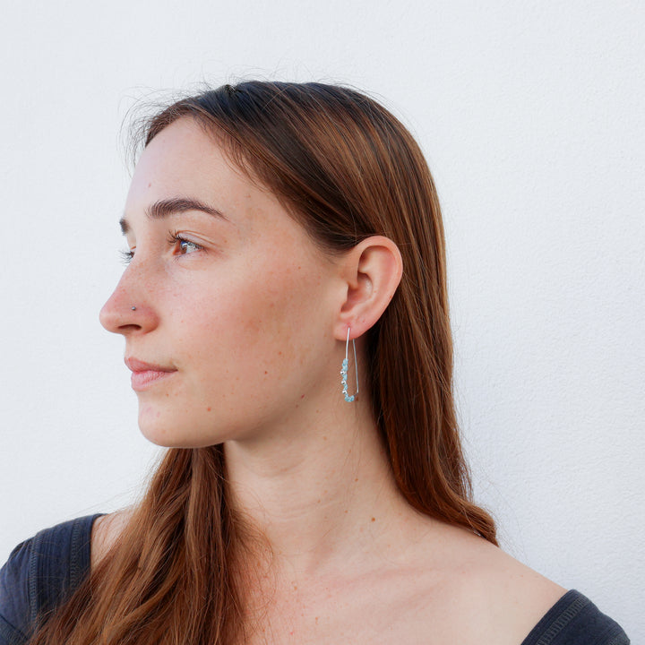 handmade sterling silver macrame hoop earrings with aqua blue cord