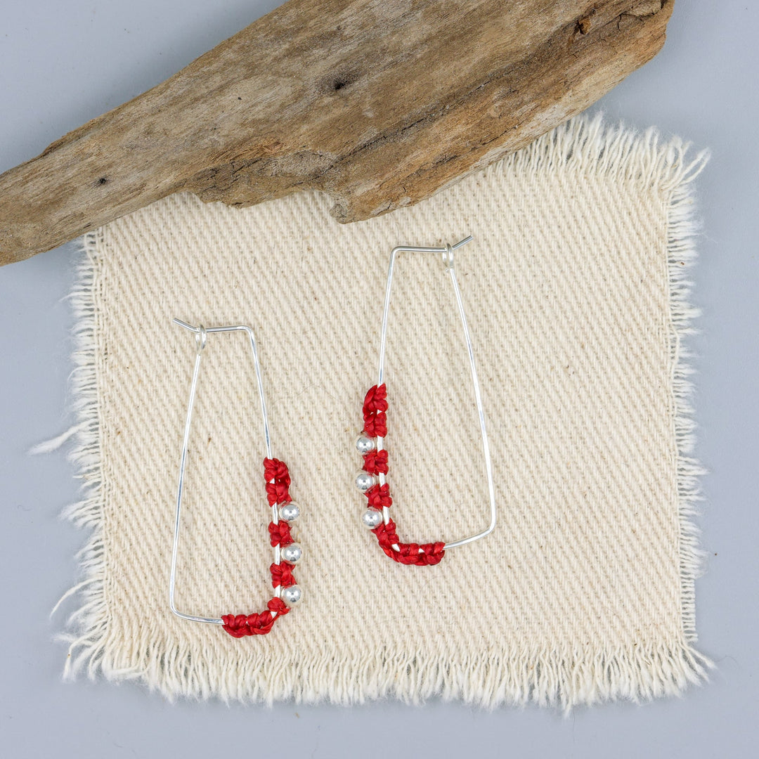 handmade sterling silver red macrame hoop earrings overhad view