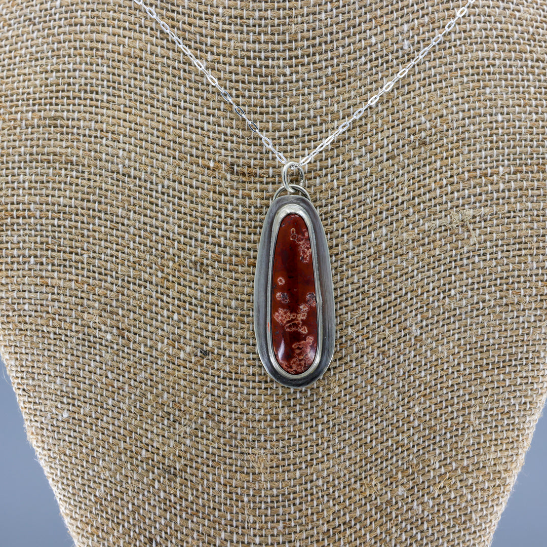 handmade red jasper sterling silver pendant on sterling silver chain close up view