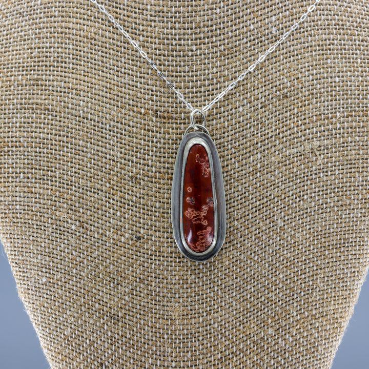 handmade red jasper sterling silver pendant on sterling silver chain close up view