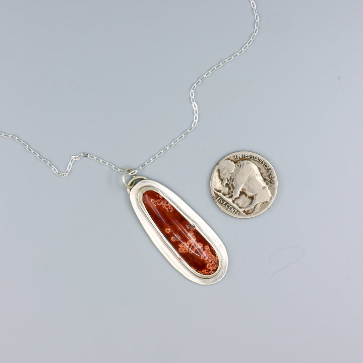 handmade red jasper sterling silver pendant on sterling silver chain with a nickel for size comparison