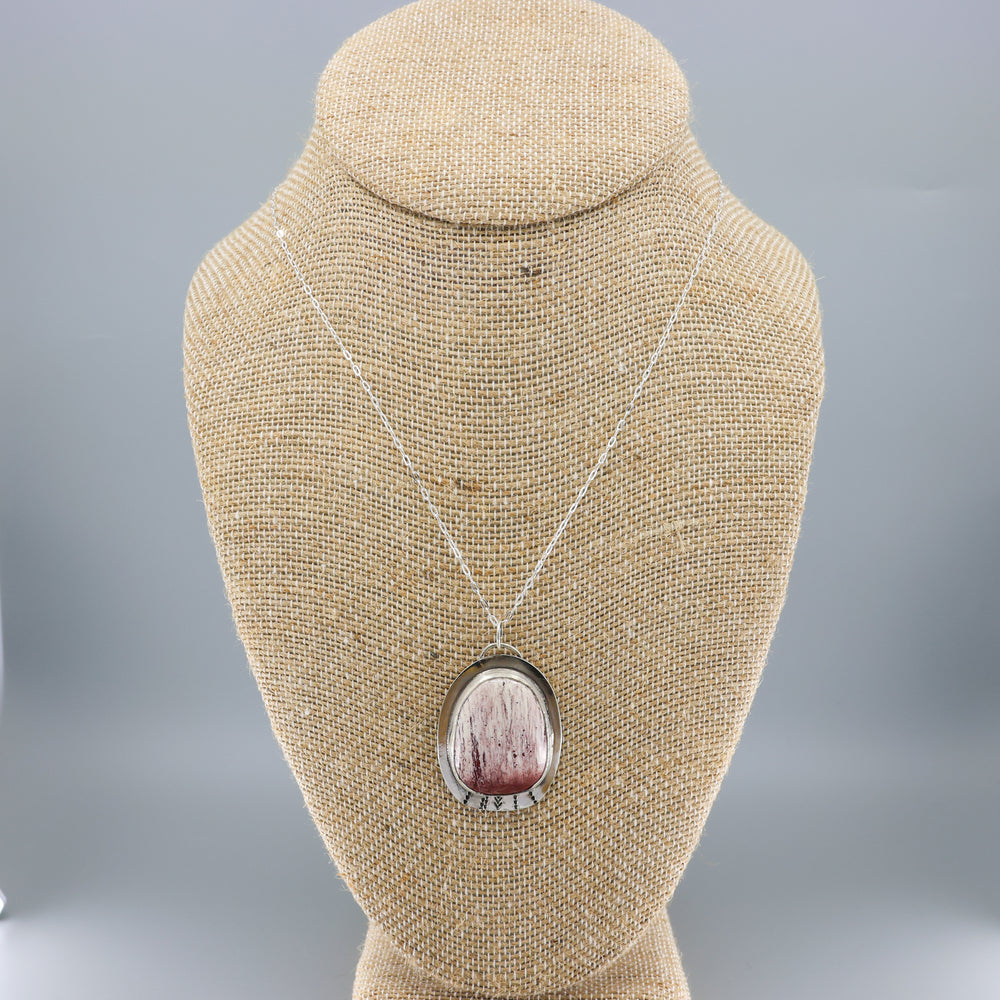 handmade jasper and sterling silver necklace on a mannequin