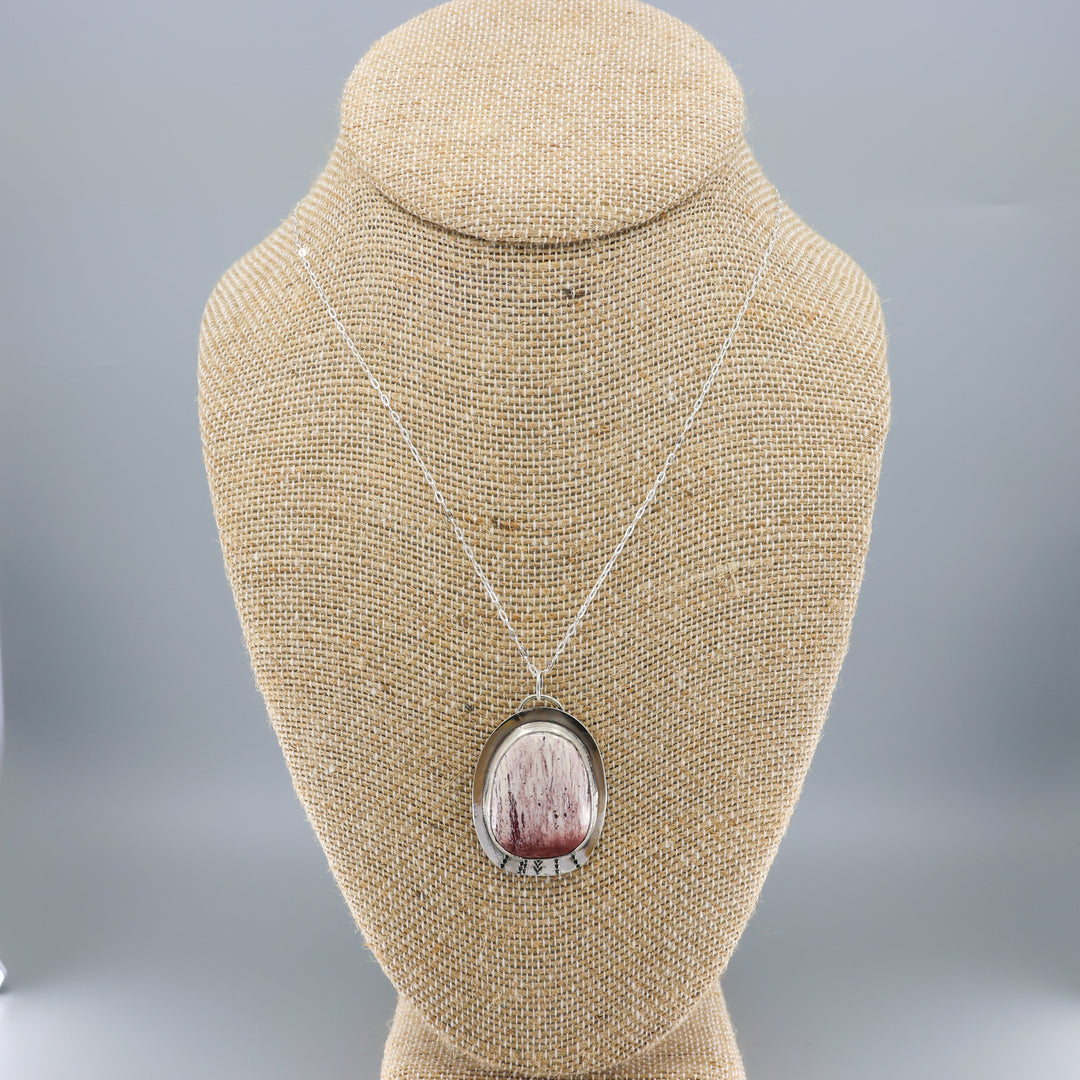 handmade jasper and sterling silver necklace on a mannequin