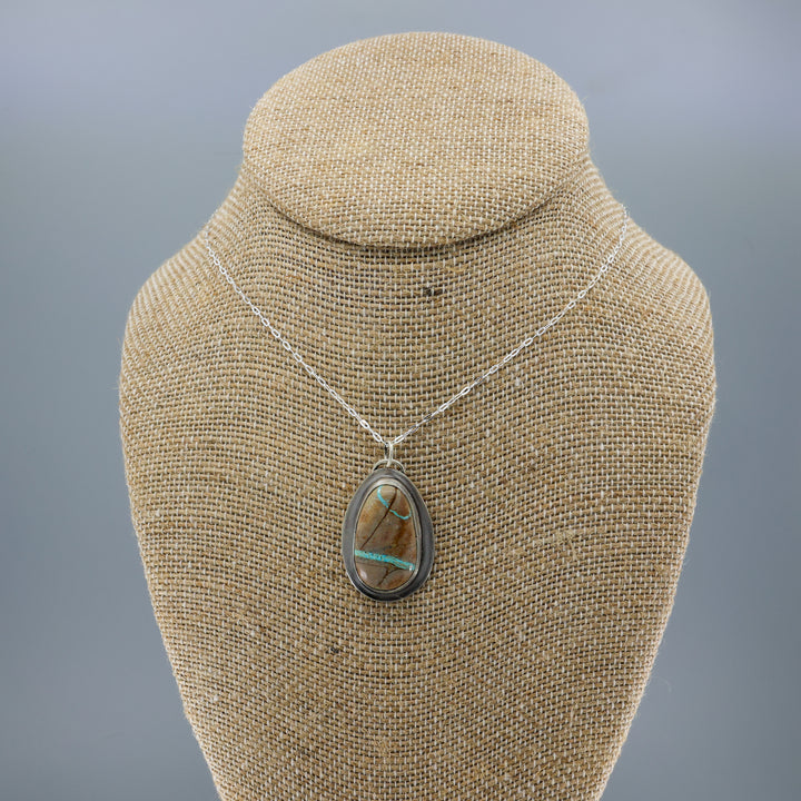 handmade ribbon turquoise oval shaped pendant necklace OOAK on a burlap bust